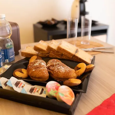 Dimora Rossa ベッド・アンド・ブレックファスト 3*